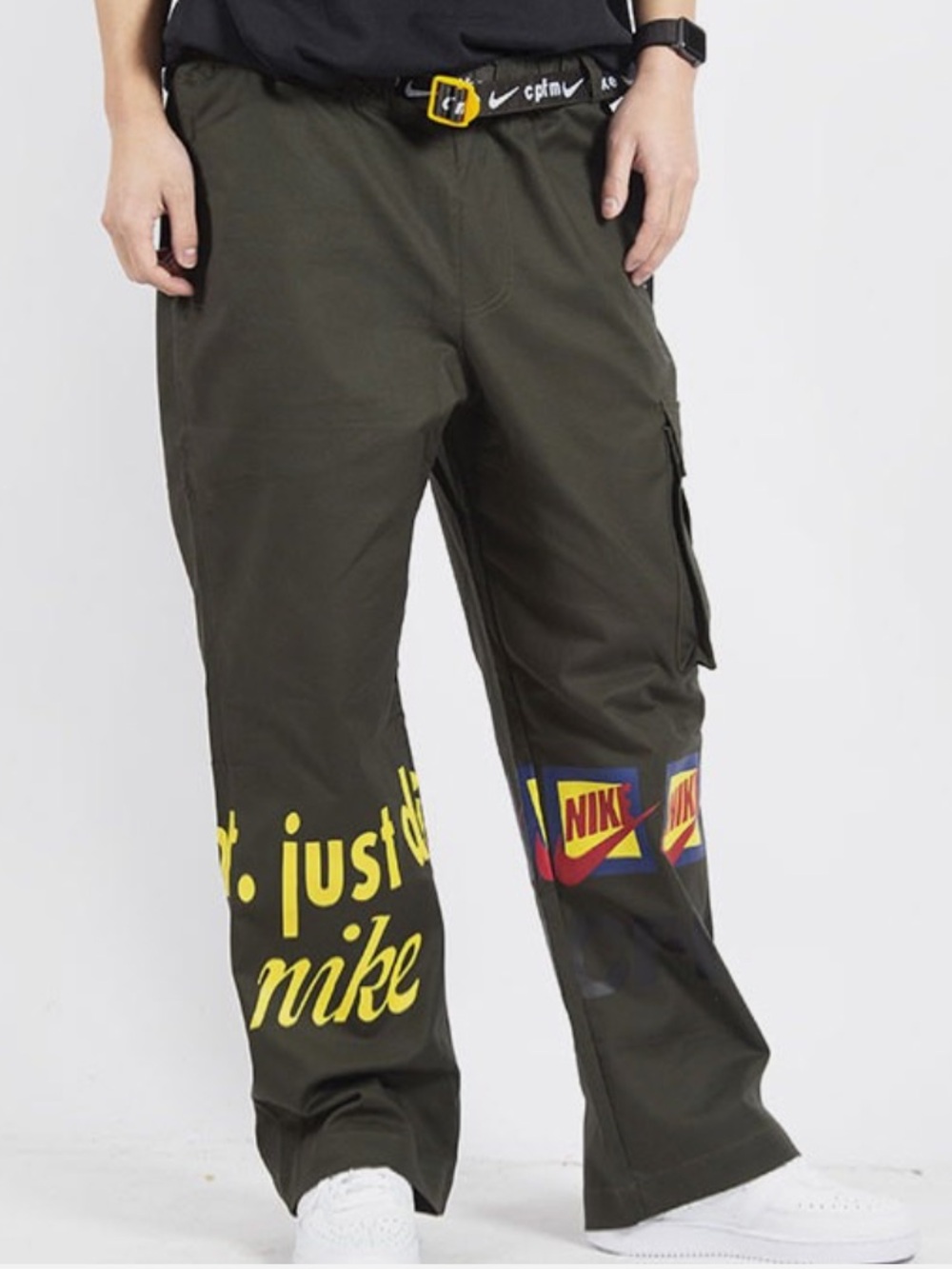 Nike x Cactus Plant Flea Market (CPFM) Track Pants in the Olive Colorway